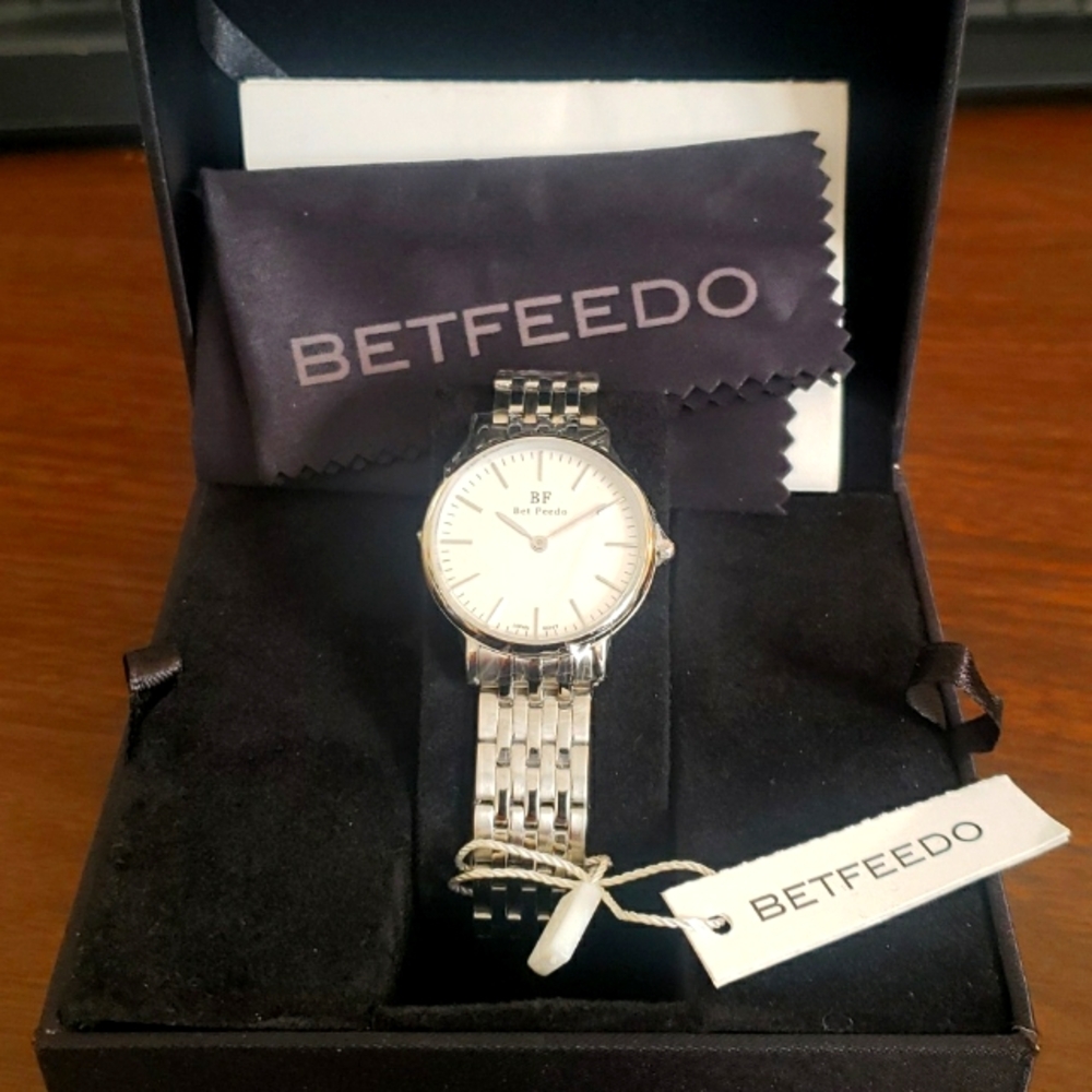 New In Box, BETFEEDO Women Silver Casual Watch,White Face Butterfly Clasp